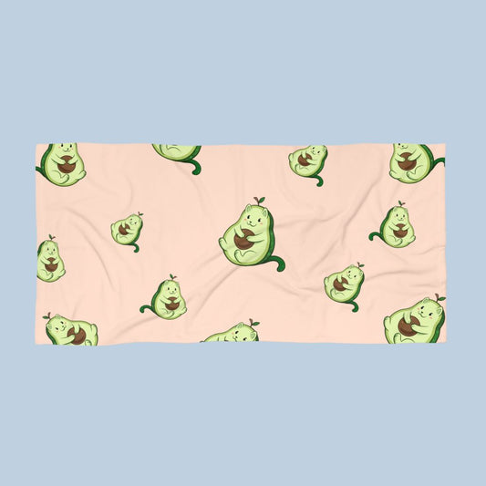 Beige Beach Towel with Pawocado⢠print. Pawocado⢠is an avocado drawn as a cute cat.