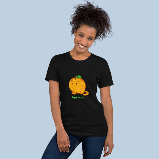 Woman wearing a black T-Shirt with Apricat⢠print. Apricat⢠is an apricot drawn as a cute cat.