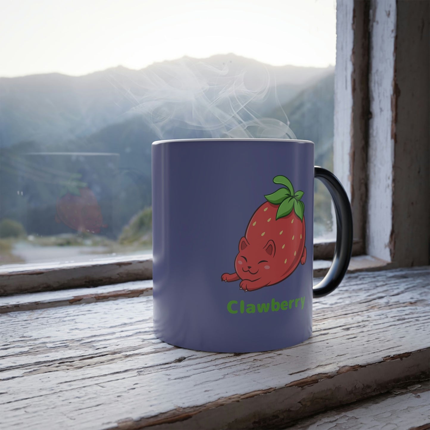 Purple Magic Mug with Clawberry⢠print standing in a window. Clawberry⢠is a strawberry drawn as a cute cat.