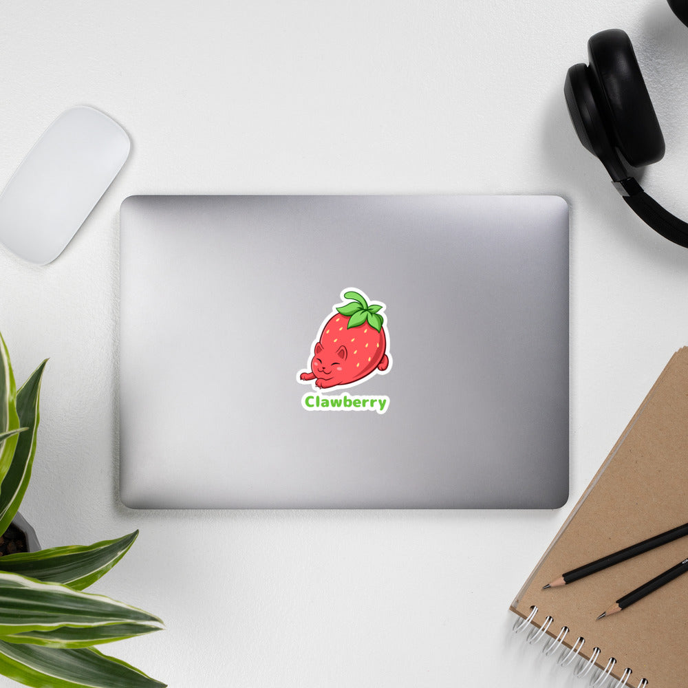 5.5 x 5.5 inch Sticker with Clawberry⢠print. The sticker is on a laptop. Clawberry⢠is a strawberry drawn as a cute cat.