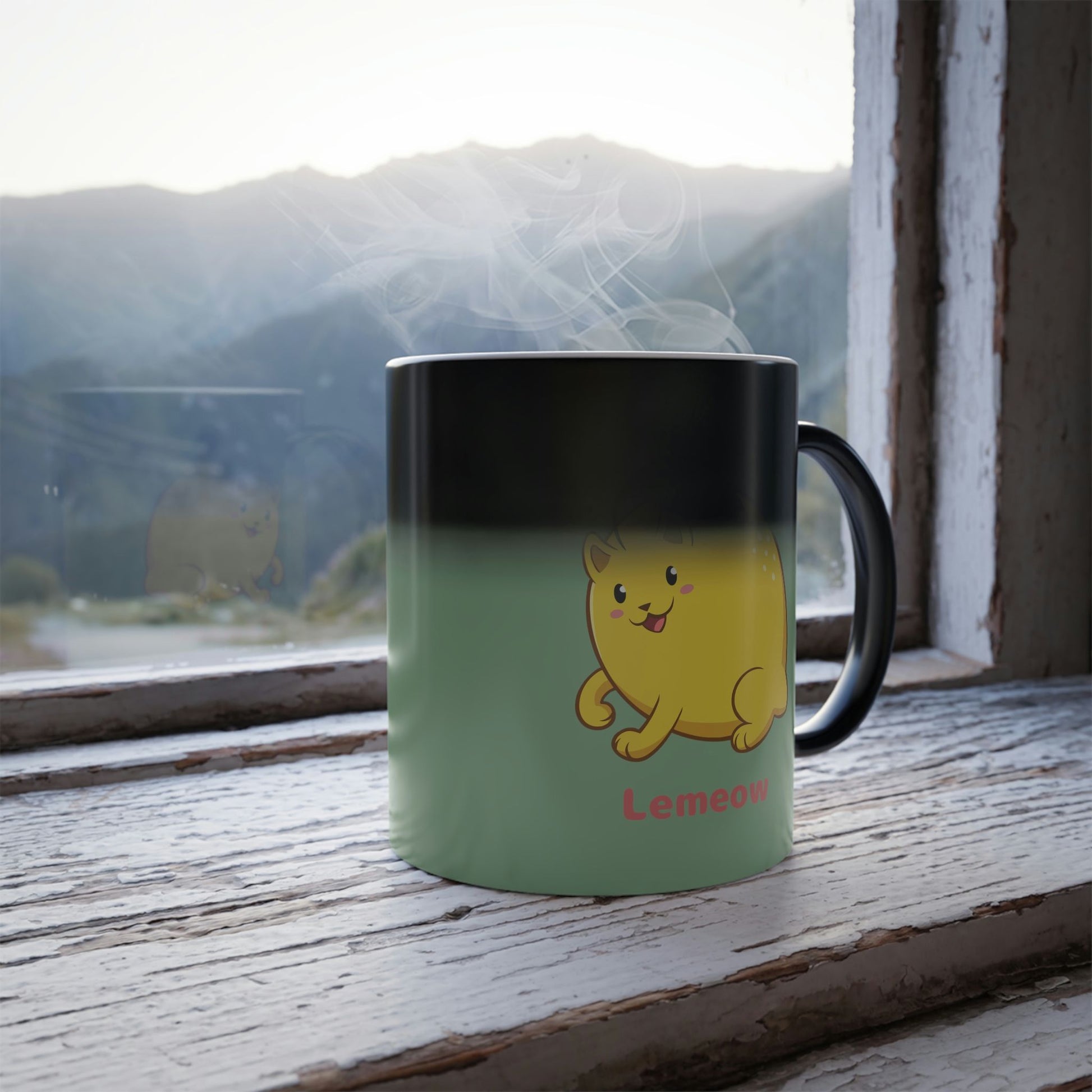 Light Green Magic Mug with Lemeow⢠print standing in a window turning from black into the print. Lemeow⢠is a lemon drawn as a cute cat.