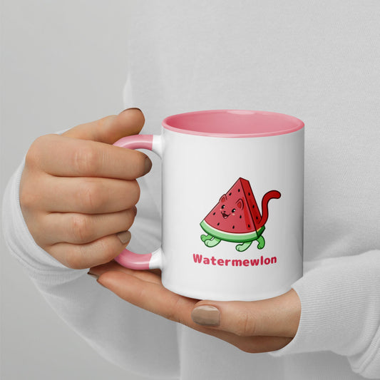 Hands holding a white and pink Coffee Mug with Watermewlon⢠print. Watermewlon⢠is a watermelon drawn as a cute cat.