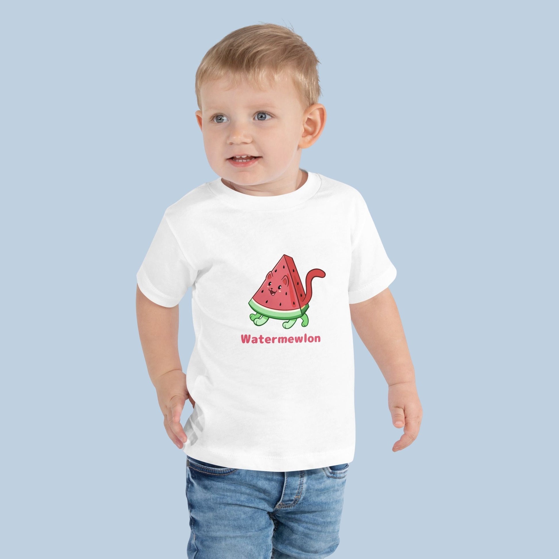 Toddler wearing a white Toddler T-Shirt with Watermewlon⢠print. Watermewlon⢠is a watermelon drawn as a cute cat.