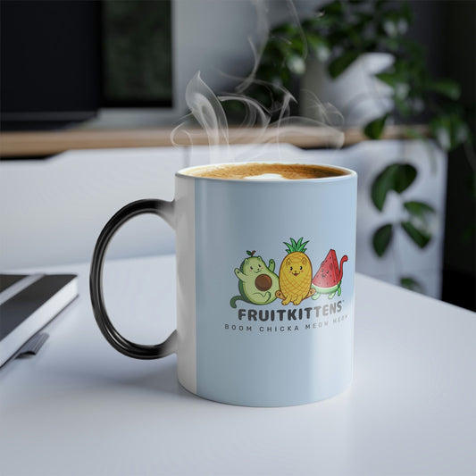 Light Blue Magic Mug with Fruitkittens⢠logo standing on an office desk. Fruitkittens⢠are fruits drawn as cute cats. The logo features Pawocadoâ˘, Pawnapple⢠and Watermewlonâ˘