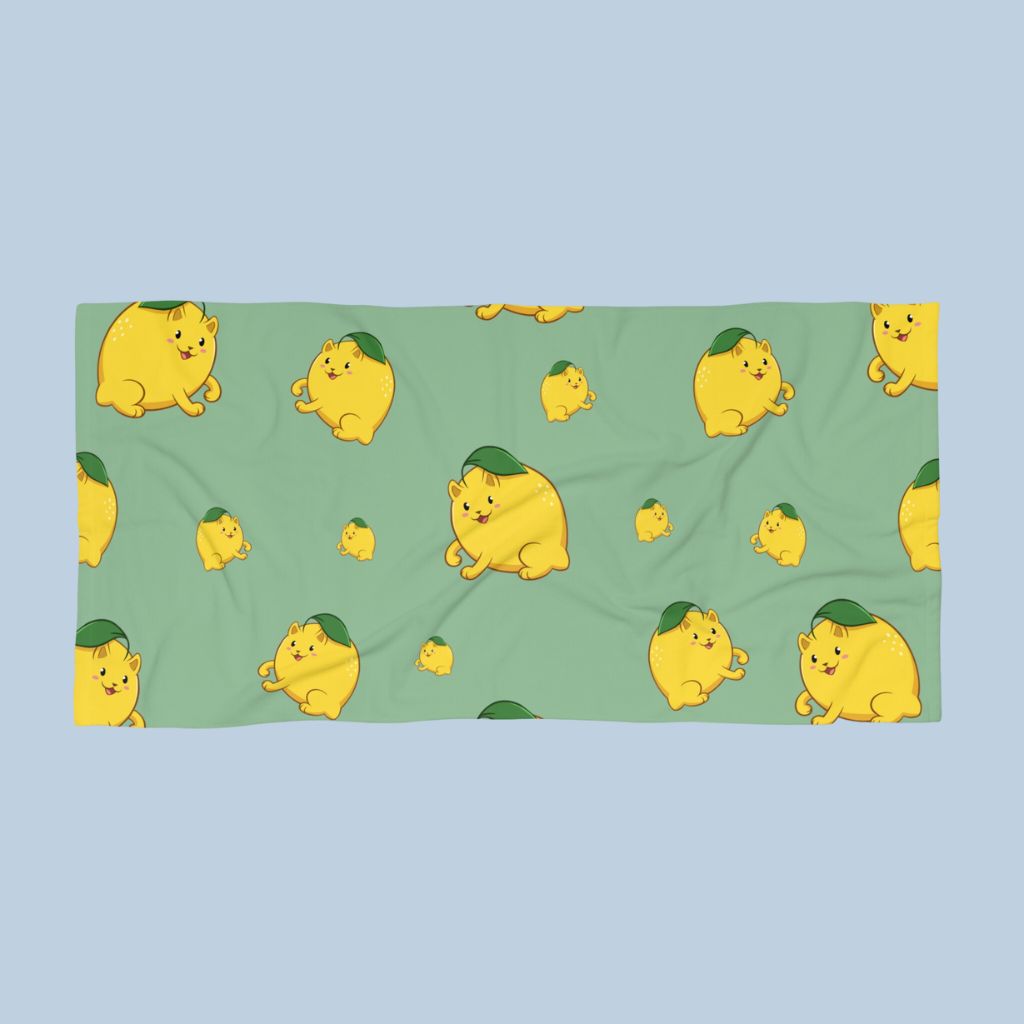 Light Green Beach Towel with Lemeow™ print. Lemeow™ is a lemon drawn as a cute cat.