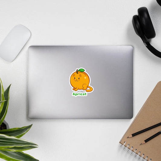 5.5 x 5.5 inch Sticker with Apricat™ print. The sticker is on a laptop. Apricat™ is an apricot drawn as a cute cat.