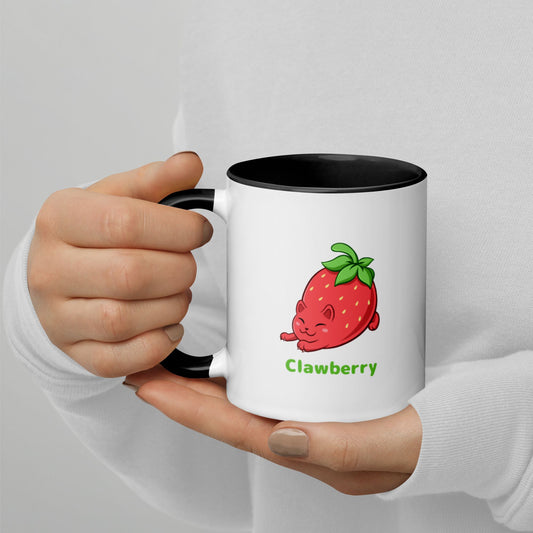 Hands holding a white and black Coffee Mug with Clawberry™ print. Clawberry™ is a strawberry drawn as a cute cat.