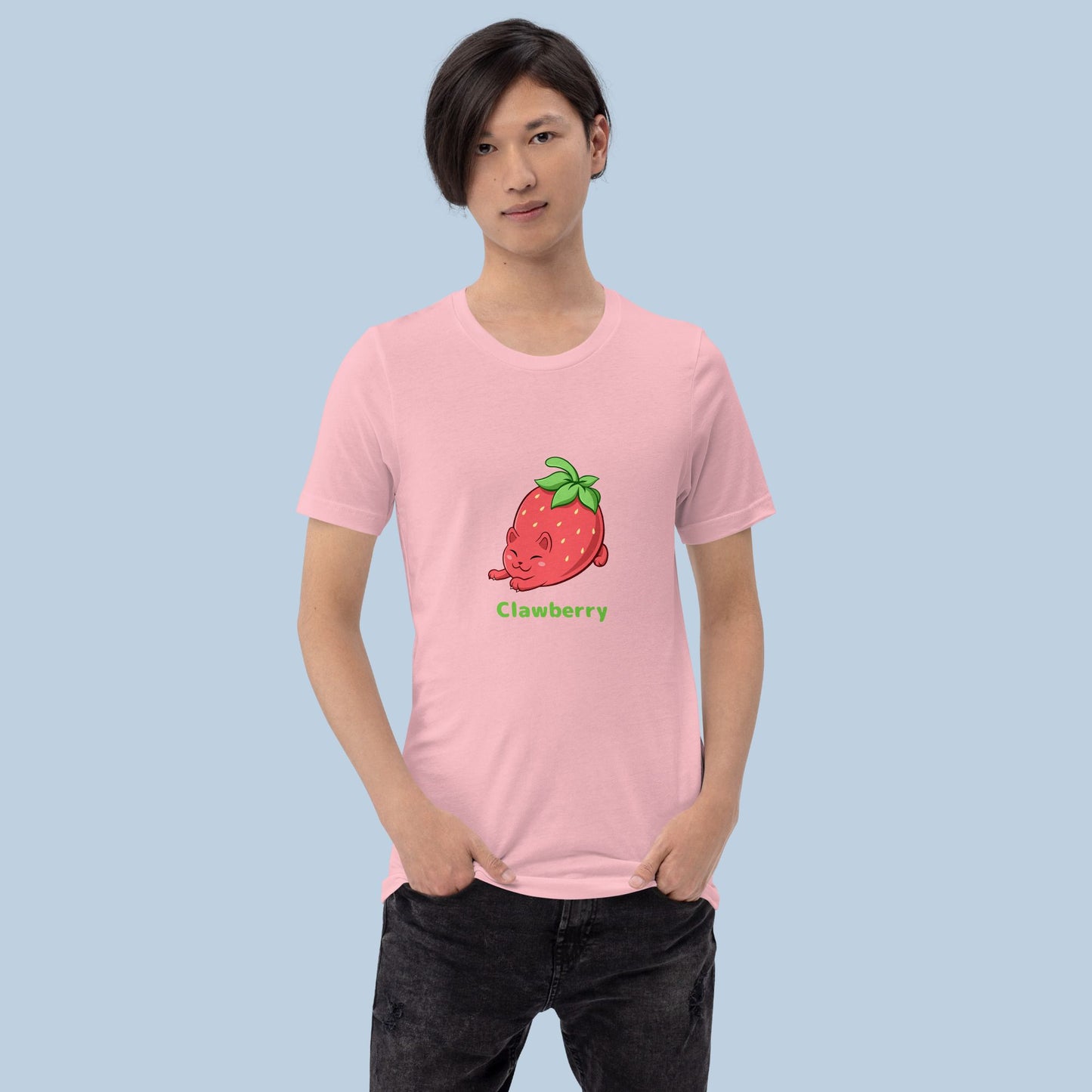 Man wearing a pink T-Shirt with Clawberry™ print. Clawberry™ is a strawberry drawn as a cute cat.