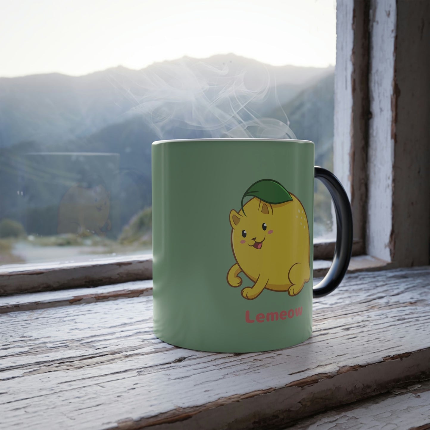 Light Green Magic Mug with Lemeow™ print standing in a window. Lemeow™ is a lemon drawn as a cute cat.