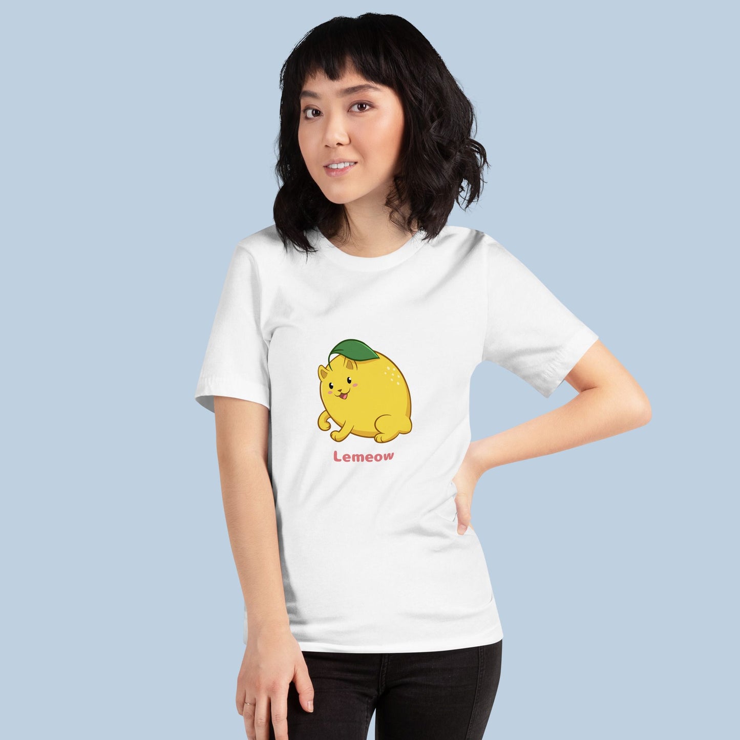 Woman wearing a white T-Shirt with Lemeow™ print. Lemeow™ is a lemon drawn as a cute cat.