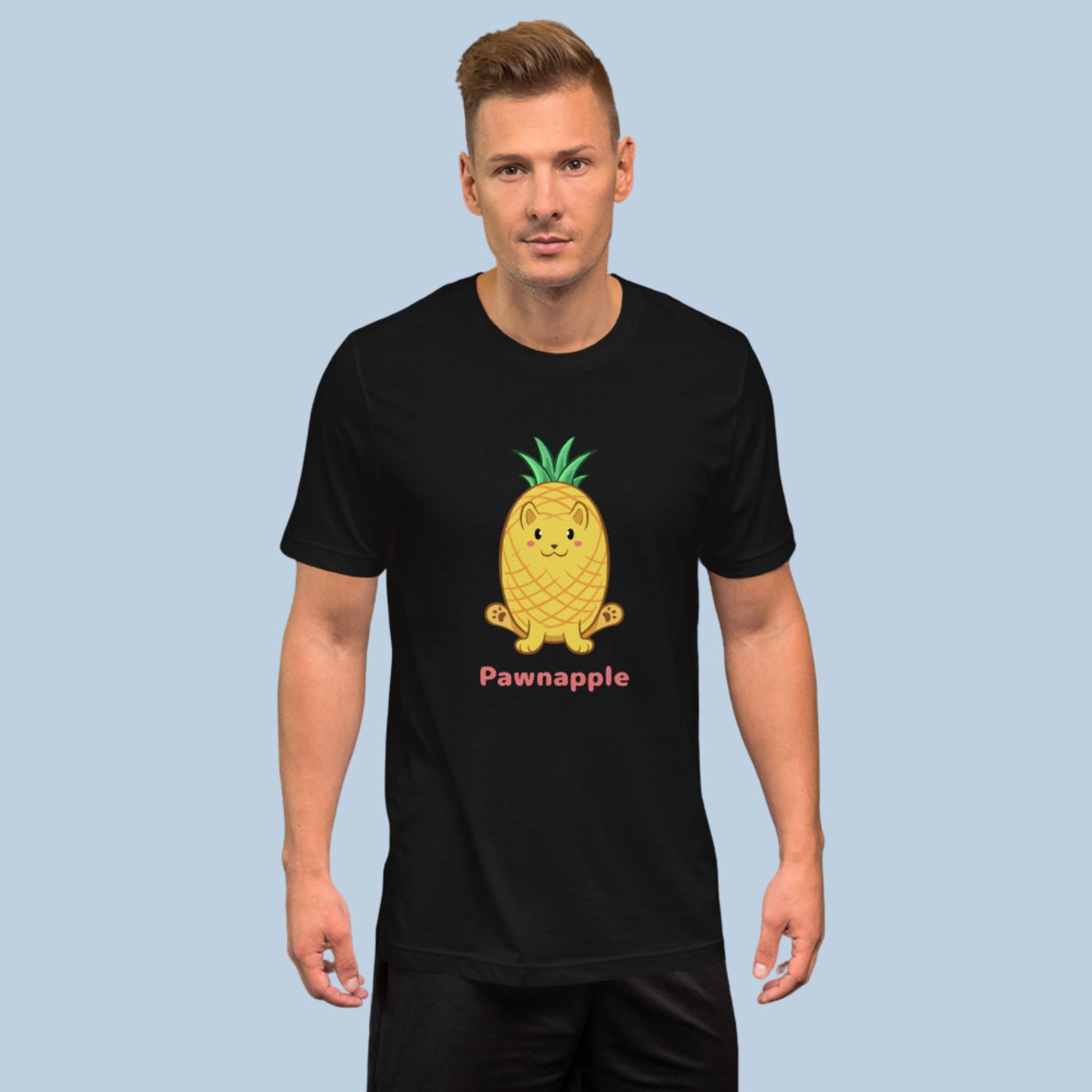 Man wearing a black T-Shirt with Pawnapple™ print. Pawnapple™ is a pineapple drawn as a cute cat.