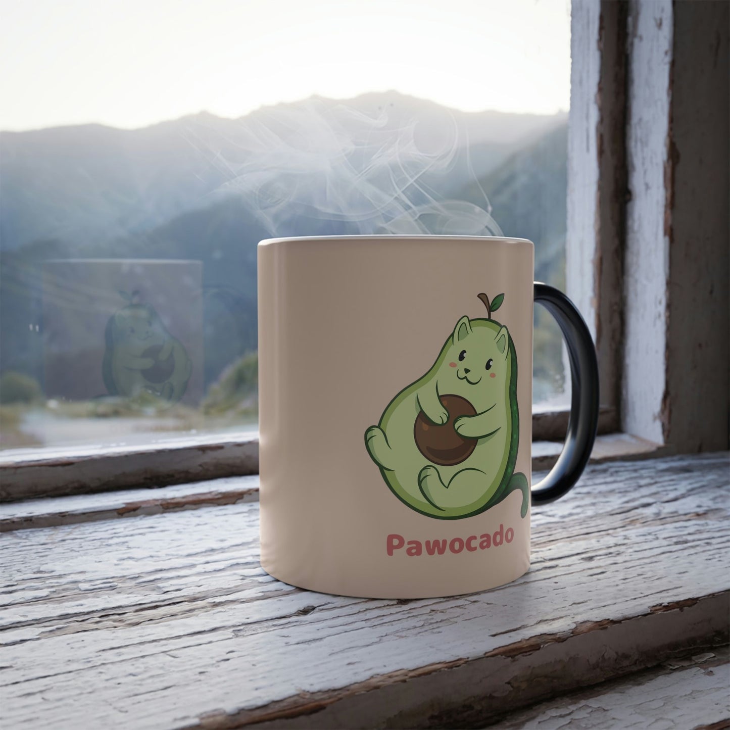 Beige Magic Mug with Pawocado™ print standing in a window. Pawocado™ is an avocado drawn as a cute cat.