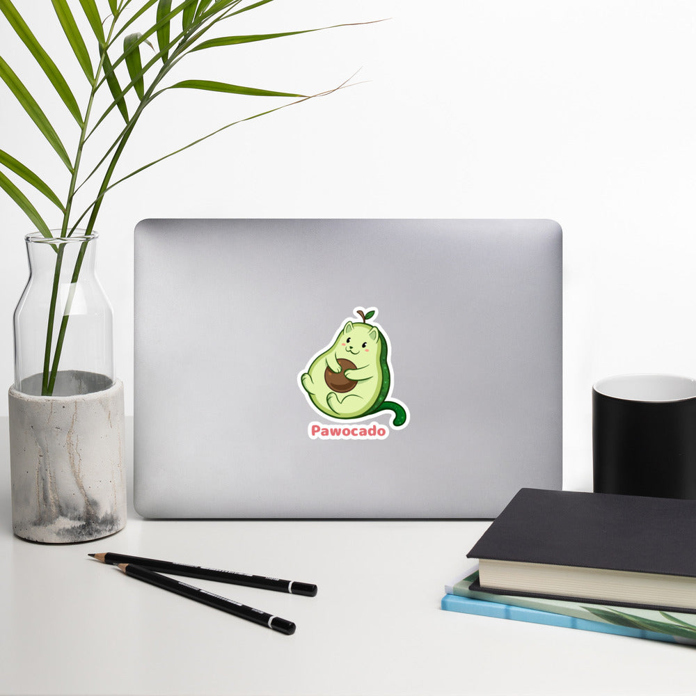 5.5 x 5.5 inch Sticker with Pawocado™ print. The sticker is on a laptop. Pawocado™ is an avocado drawn as a cute cat.