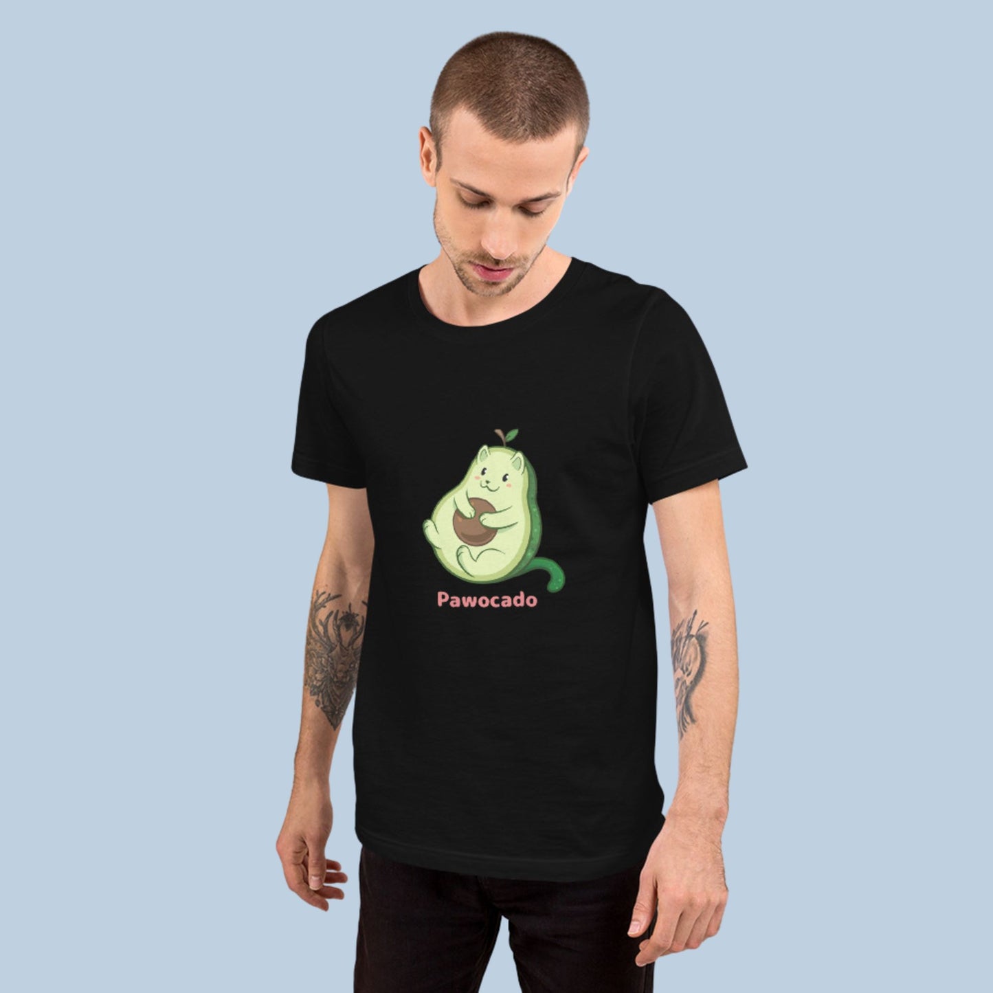 Man wearing a black T-Shirt with Pawocado™ print. Pawocado™ is an avocado drawn as a cute cat.