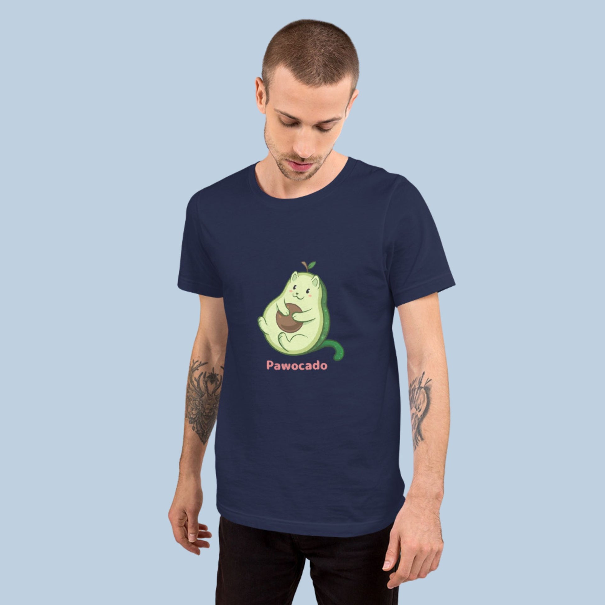 Man wearing a navy blue T-Shirt with Pawocado™ print. Pawocado™ is an avocado drawn as a cute cat.