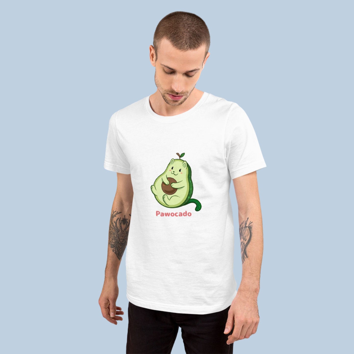 Man wearing a white T-Shirt with Pawocado™ print. Pawocado™ is an avocado drawn as a cute cat.