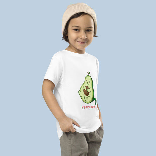 Toddler wearing a white Toddler T-Shirt with Pawocado™ print. Pawocado™ is an avocado drawn as a cute cat.