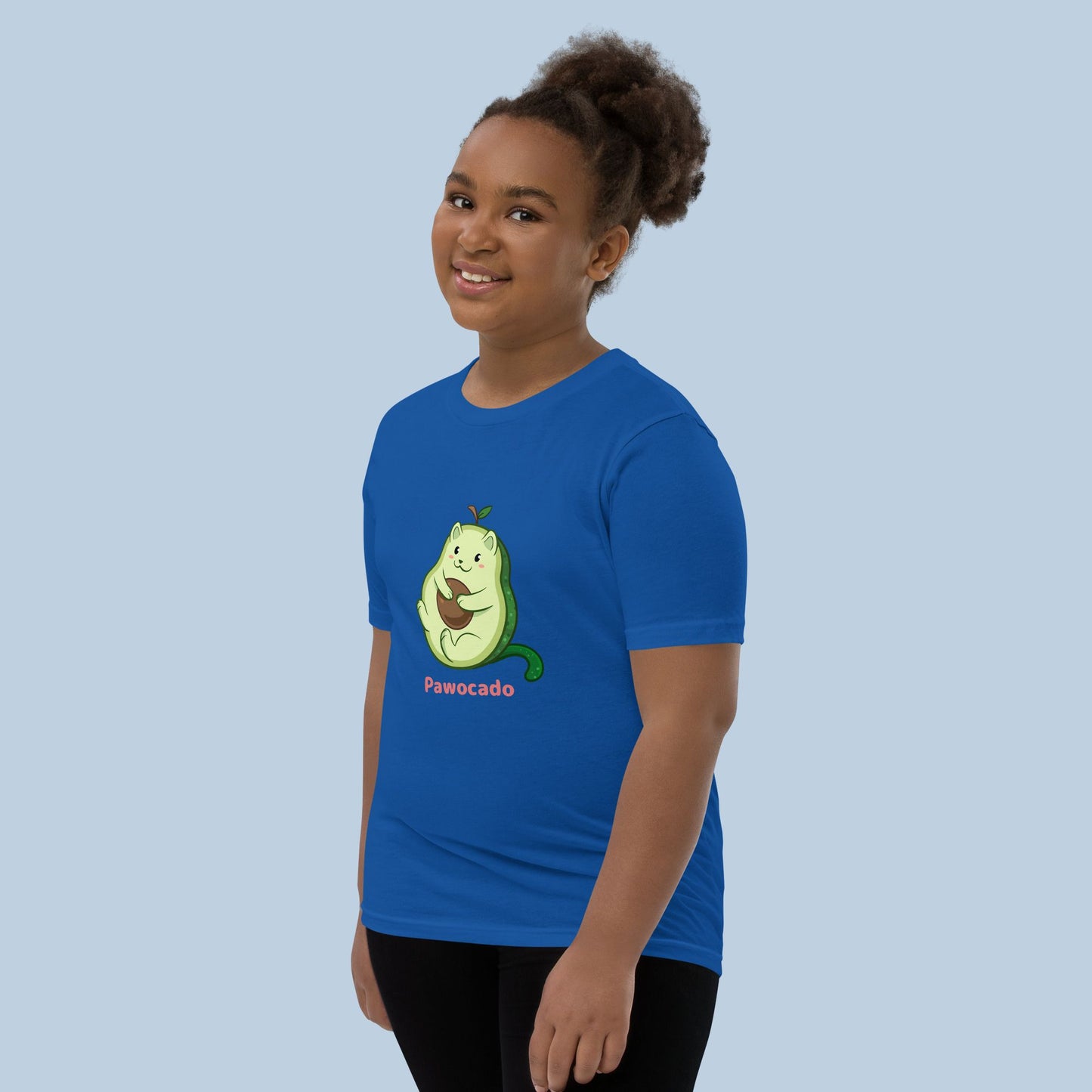 Girl wearing a royal blue T-Shirt with Pawocado™ print. Pawocado™ is an avocado drawn as a cute cat.