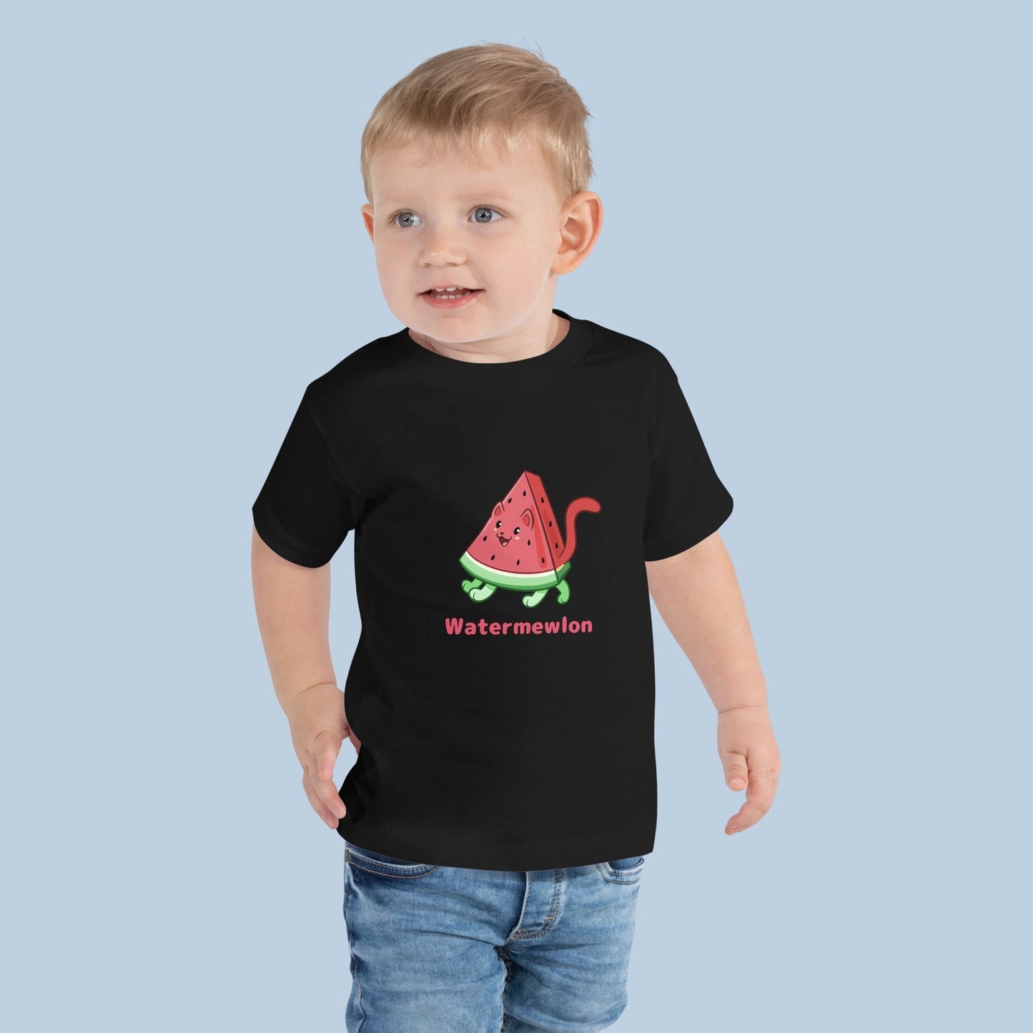 Toddler wearing a black Toddler T-Shirt with Watermewlon™ print. Watermewlon™ is a watermelon drawn as a cute cat.