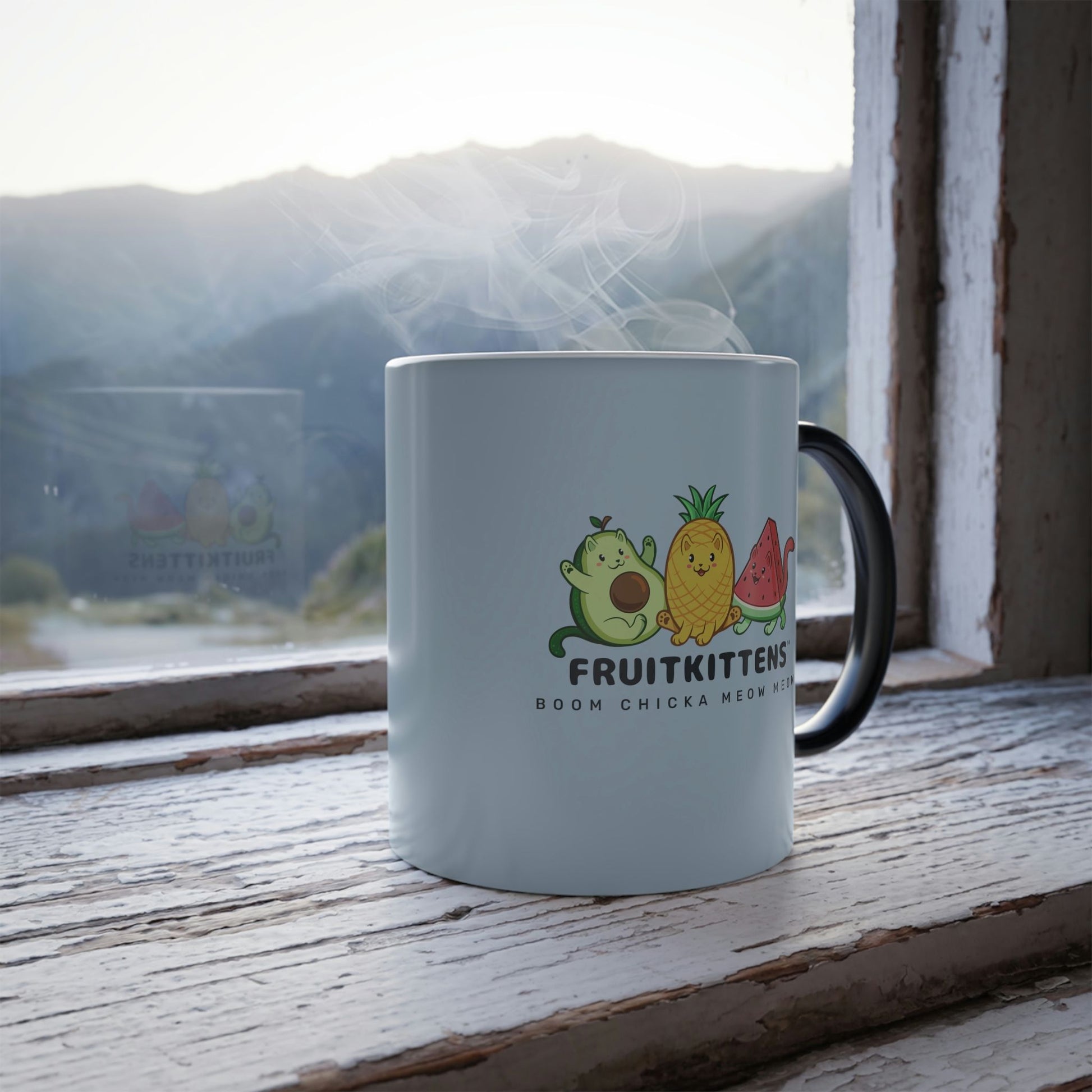 Light Blue Magic Mug with Fruitkittens™ logo standing in a window. Fruitkittens™ are fruits drawn as cute cats. The logo features Pawocado™, Pawnapple™ and Watermewlon™